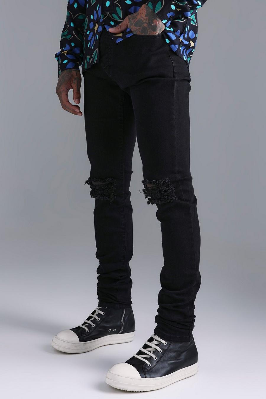 Jeans Skinny Fit Stretch con strappi sul ginocchio e pieghe sul fondo, Washed black