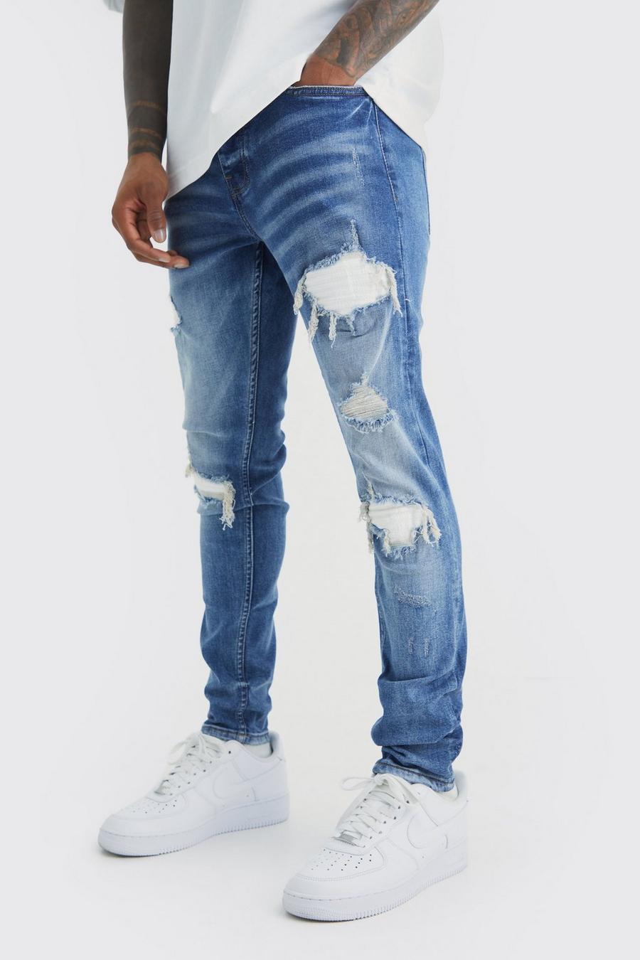 Mid blue Slitna skinny jeans med lagningar och stretch