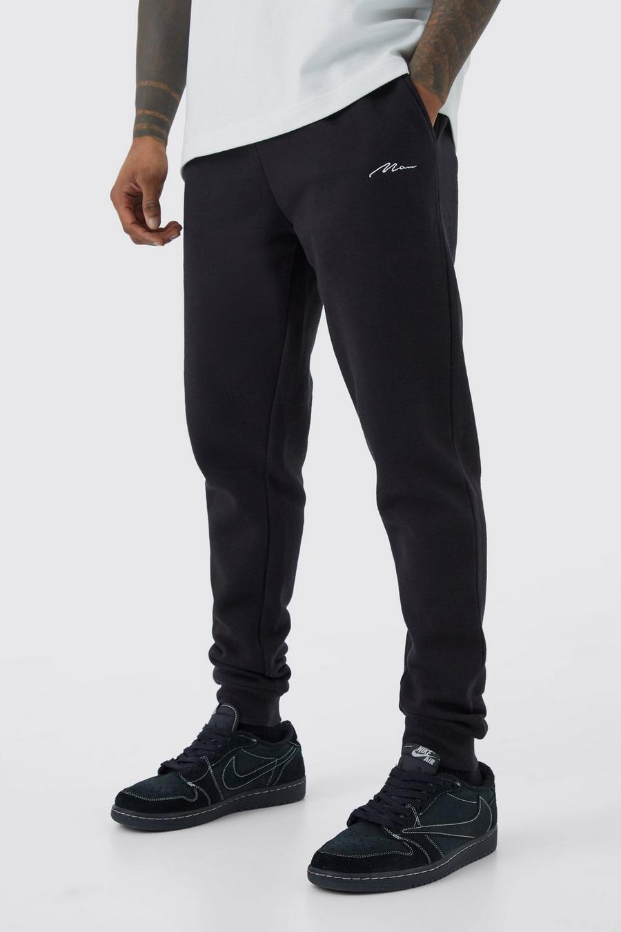 Pantaloni tuta Skinny Fit con firma Man, Black image number 1