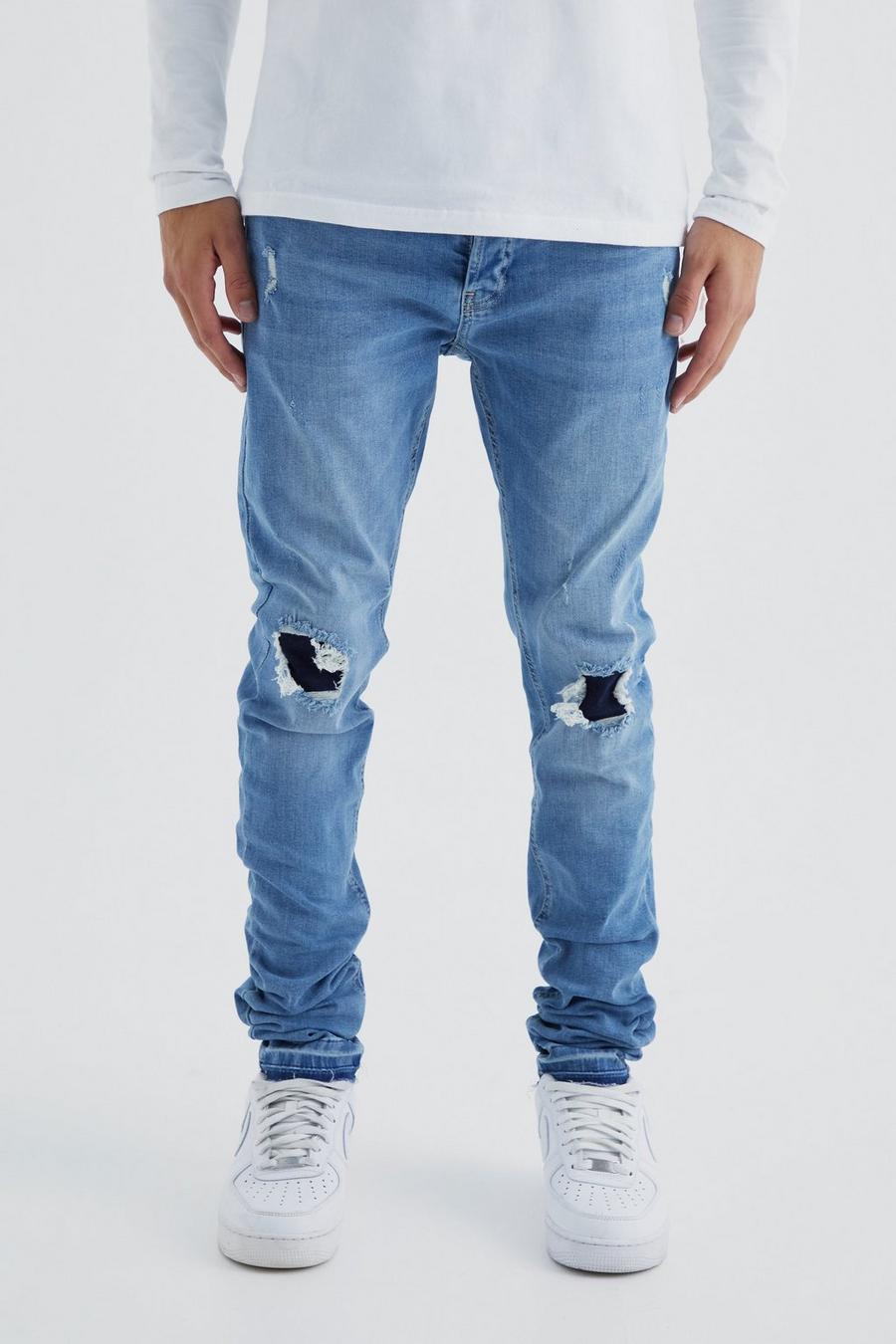 Jeans Skinny Fit con pieghe, smagliature e fondo smagliato, Light blue