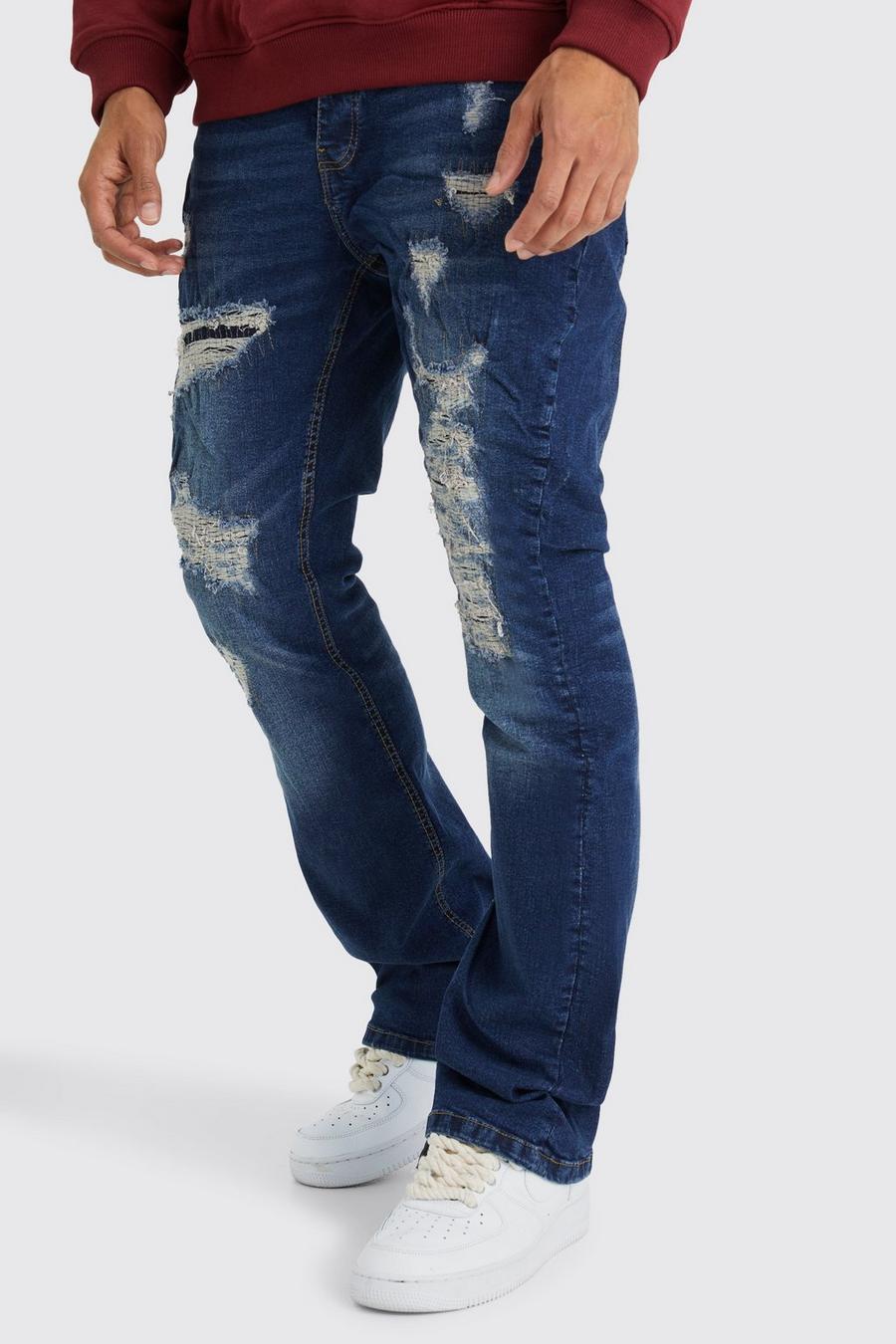 Jeans a zampa Slim Fit in denim rigido con strappi riparati, Dark blue
