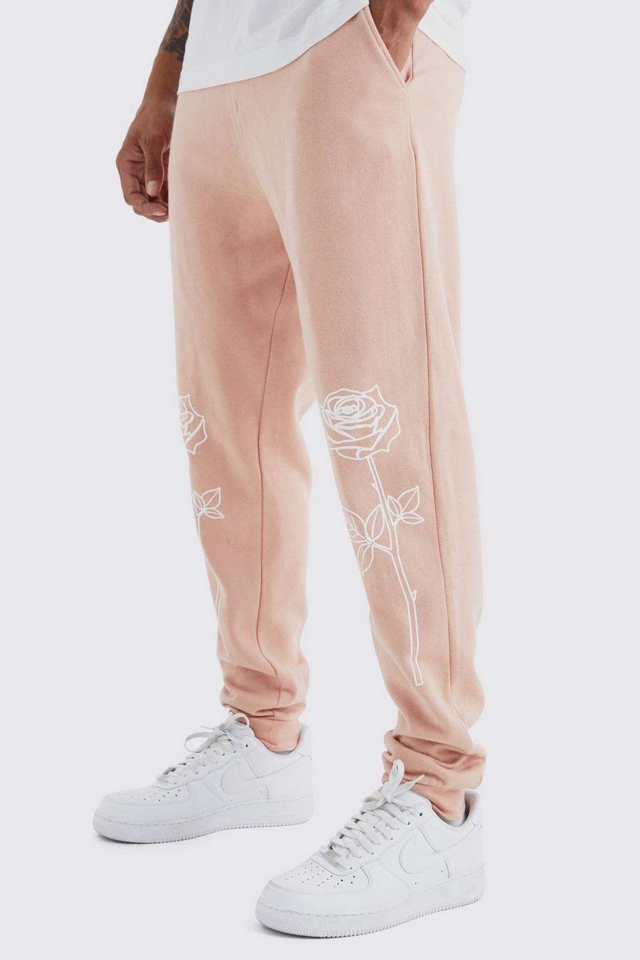 Pantalón deportivo oversize con estampado gráfico de rosa en la espalda, Dusty pink