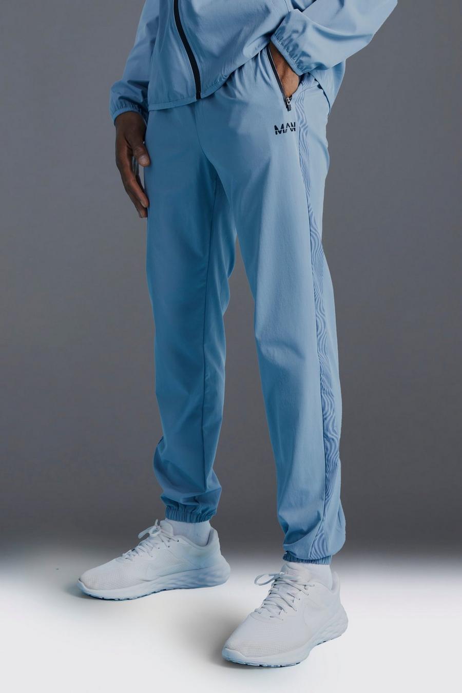 Man Active Skinny Jogginghose mit Print, Light blue image number 1