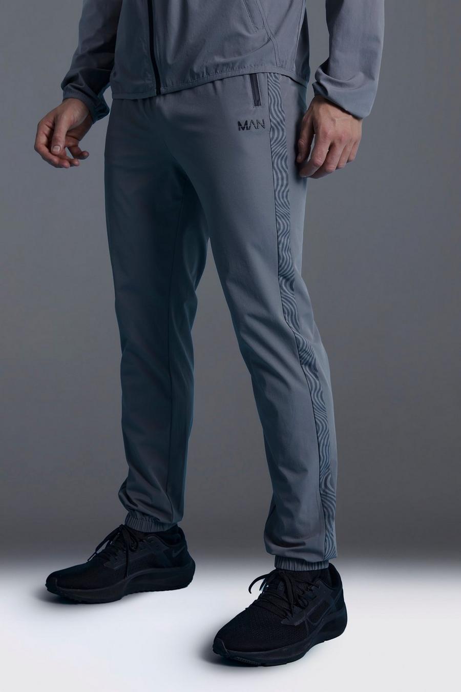 Pantalón deportivo MAN Active pitillo con estampado geométrico, Charcoal