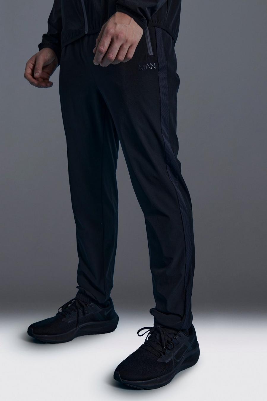 Pantalón deportivo MAN Active pitillo con estampado geométrico, Black