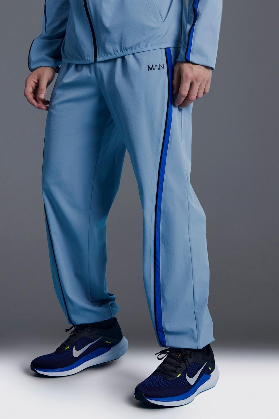 Pantaloni tuta Man Active a blocchi di colore, Light blue