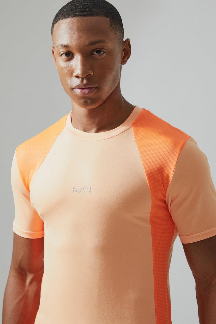 T-shirt attillata Man Active a blocchi di colore in rete, Orange image number 1