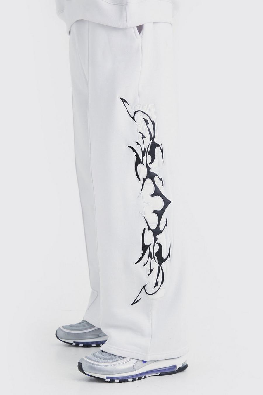Pantalón deportivo de pernera ancha con aplique de cuero sintético, White