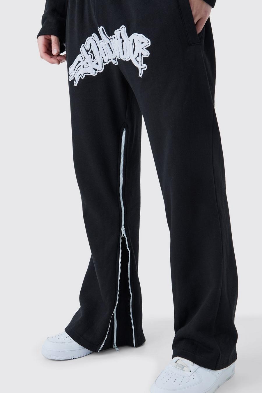 Pantaloni tuta Worldwide con inserti, applique e zip, Black