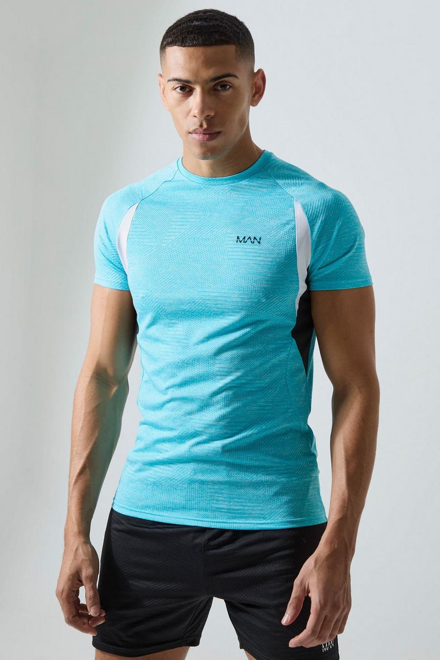 T-shirt attillata Man Active in jacquard con motivi geometrici, Aqua