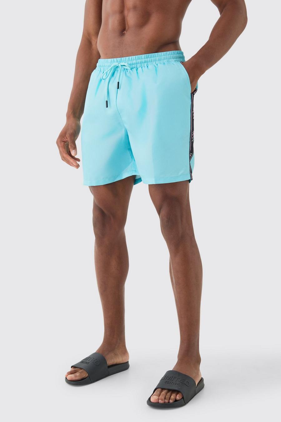 Cobalt Mid Length Man Tape Swim Shorts