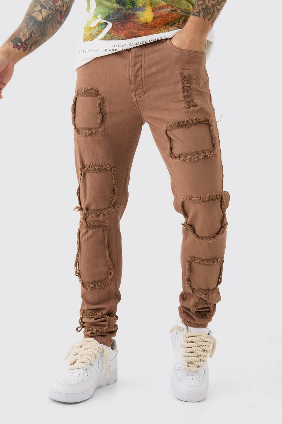 Jeans Skinny Fit in Stretch a effetto smagliato con strappi & rattoppi in lavaggio color pietra, Stone image number 1