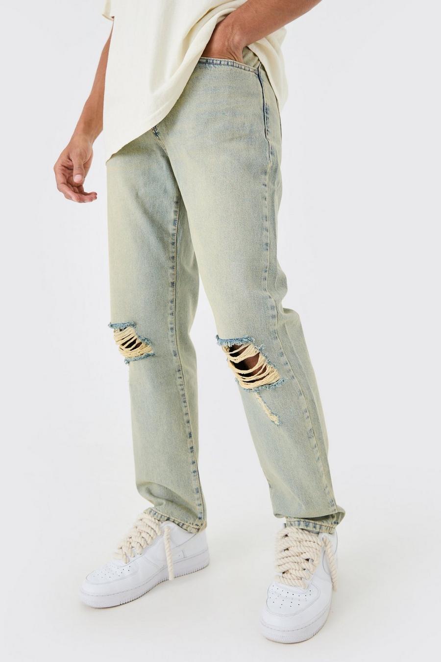 Antique blue Jeans i rigid denim med slitna knän och ledig passform