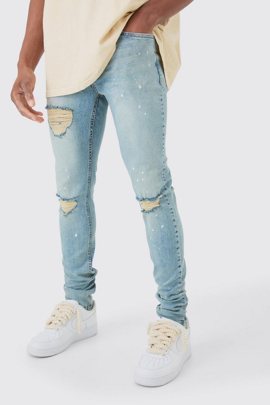 Skinny Stretch Stacked Ripped Paint Splatter Jeans In Ice Blue image number 1
