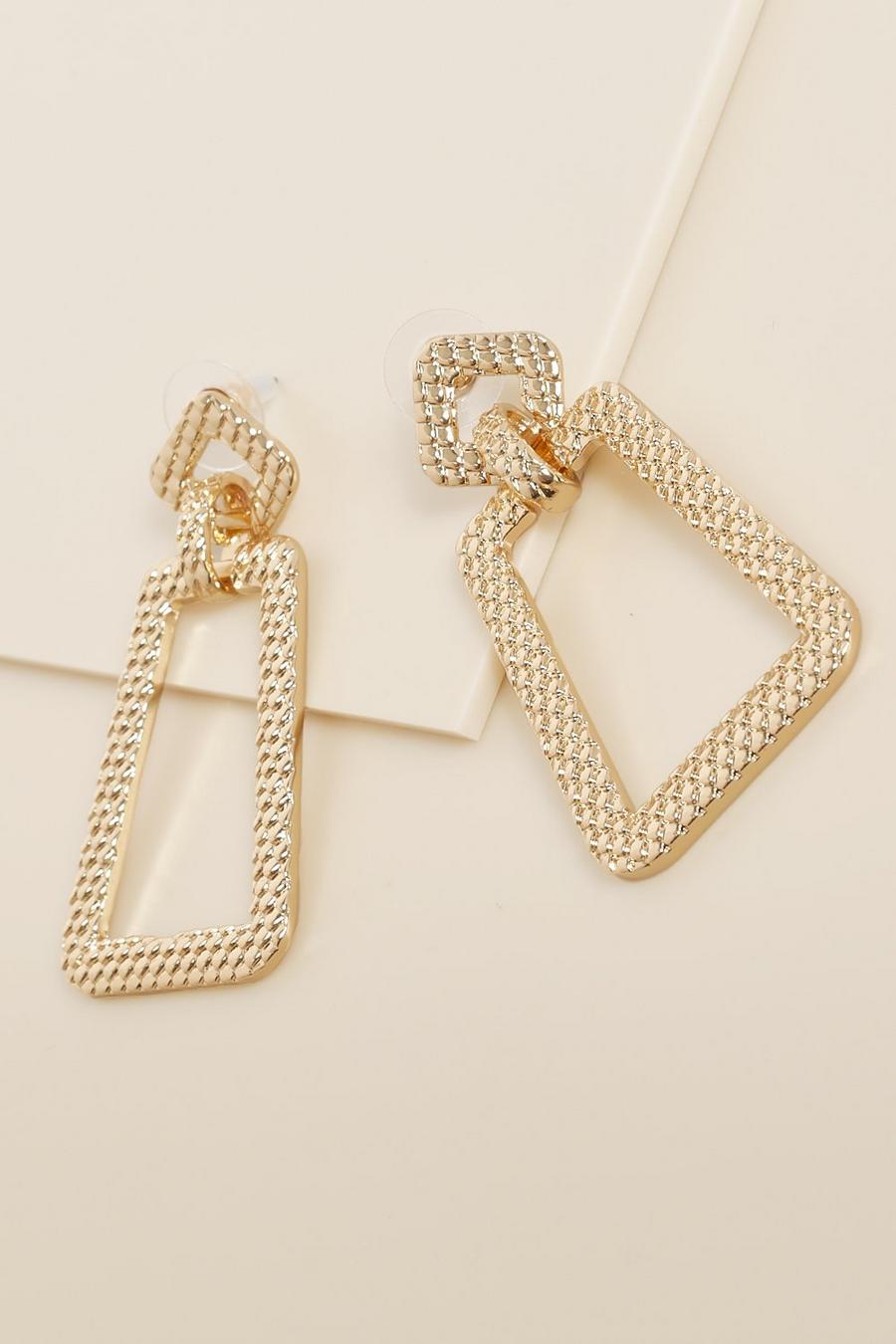 Gold Textured Metal Oversized Earrings image number 1