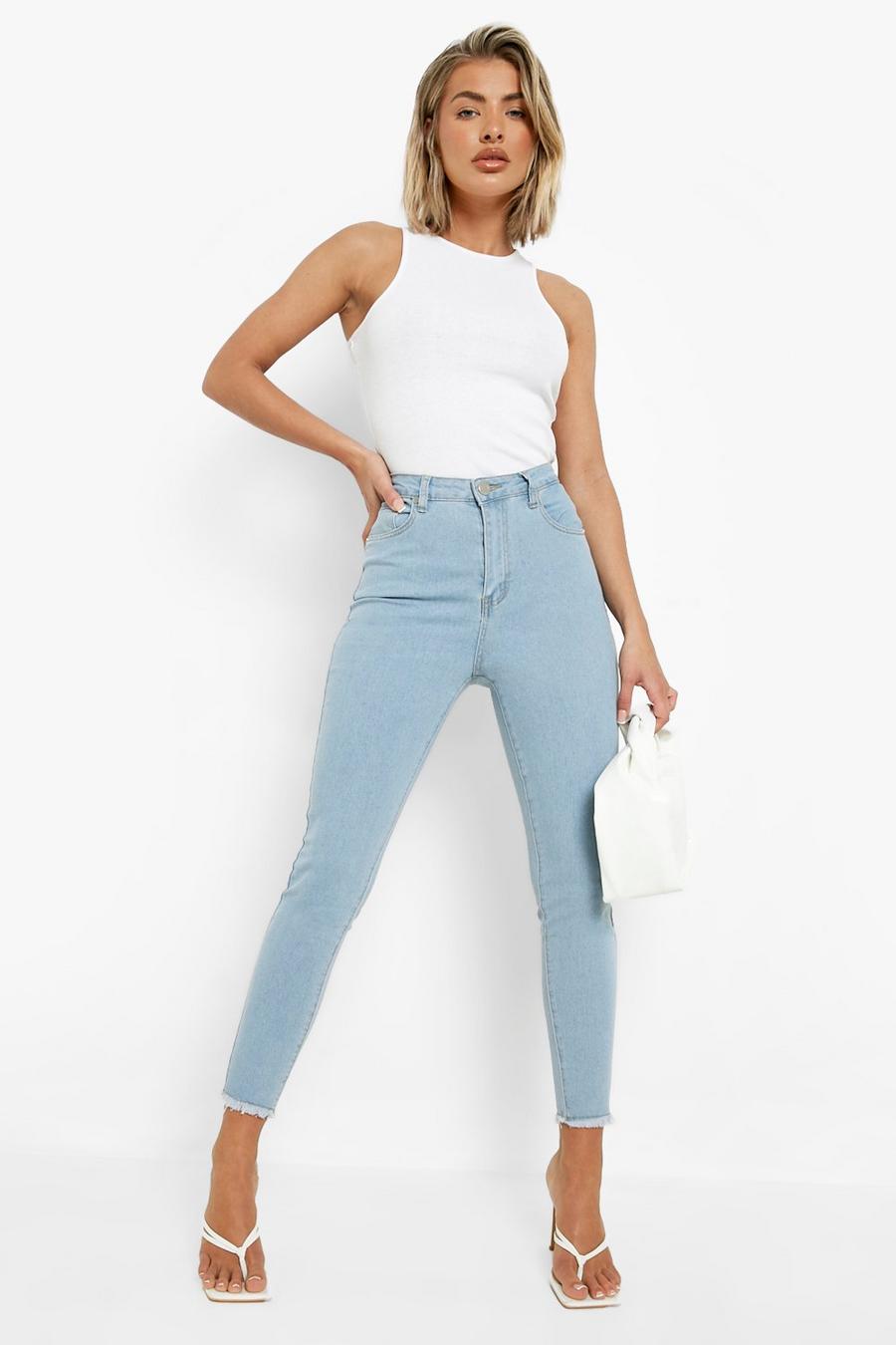 Jeans Basics Skinny Fit a vita alta con fondo sfilacciato, Light blue