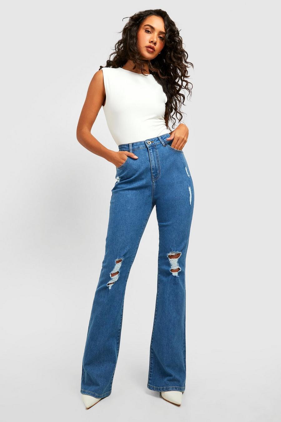 Mid wash High Waisted Ripped Flared Jeans