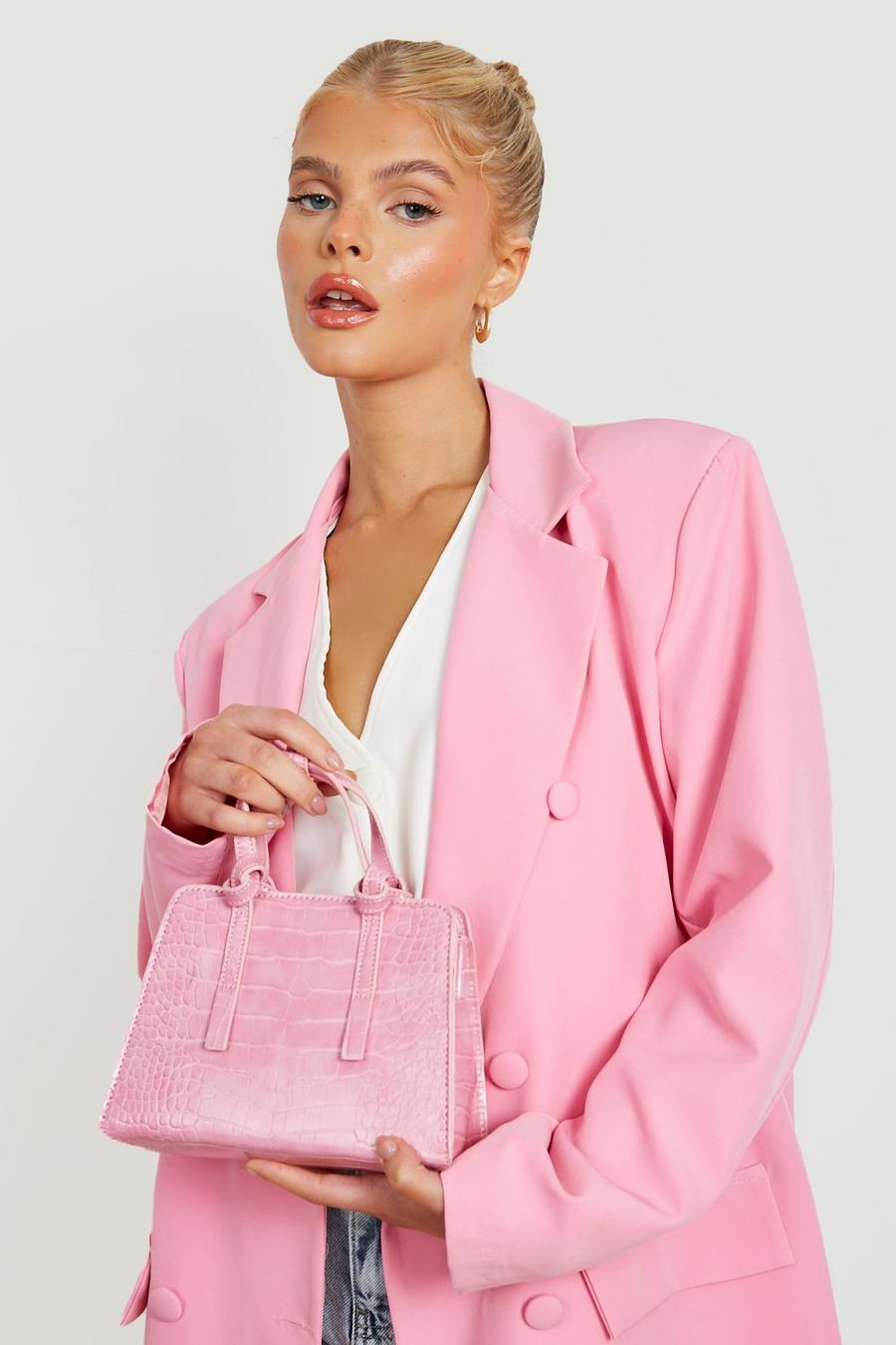 Pink Liten handväska med krokodilskinnseffekt image number 1