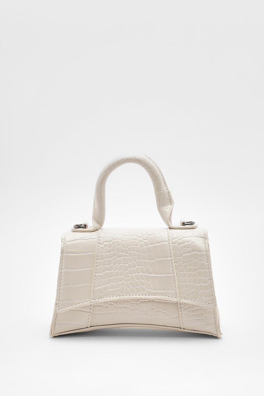 Cream Liten handväska med rund form