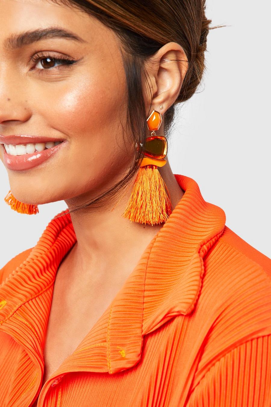 Orange Örhängen med tofsar och smyckestenar