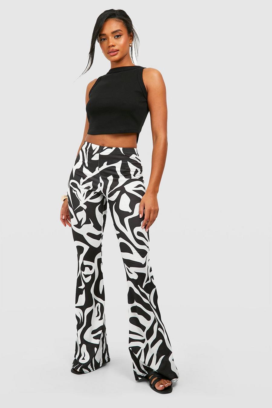 Black Abstract Printed Flared Trousers image number 1