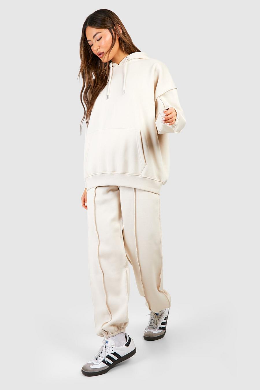 Stone Exposed Seam Oversized Track Pants image number 1
