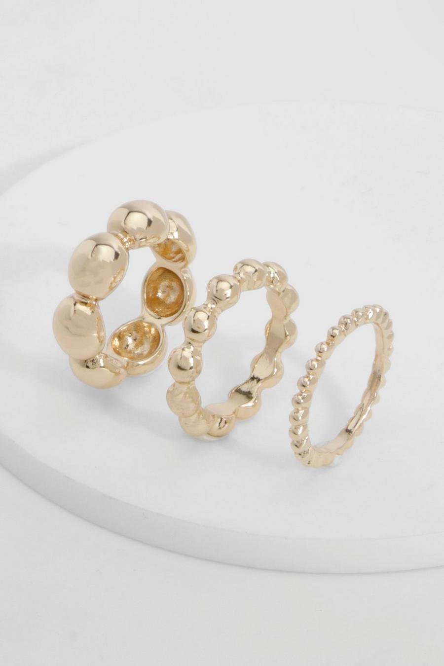 Multipaquete de anillos con forma de orbe, Gold image number 1