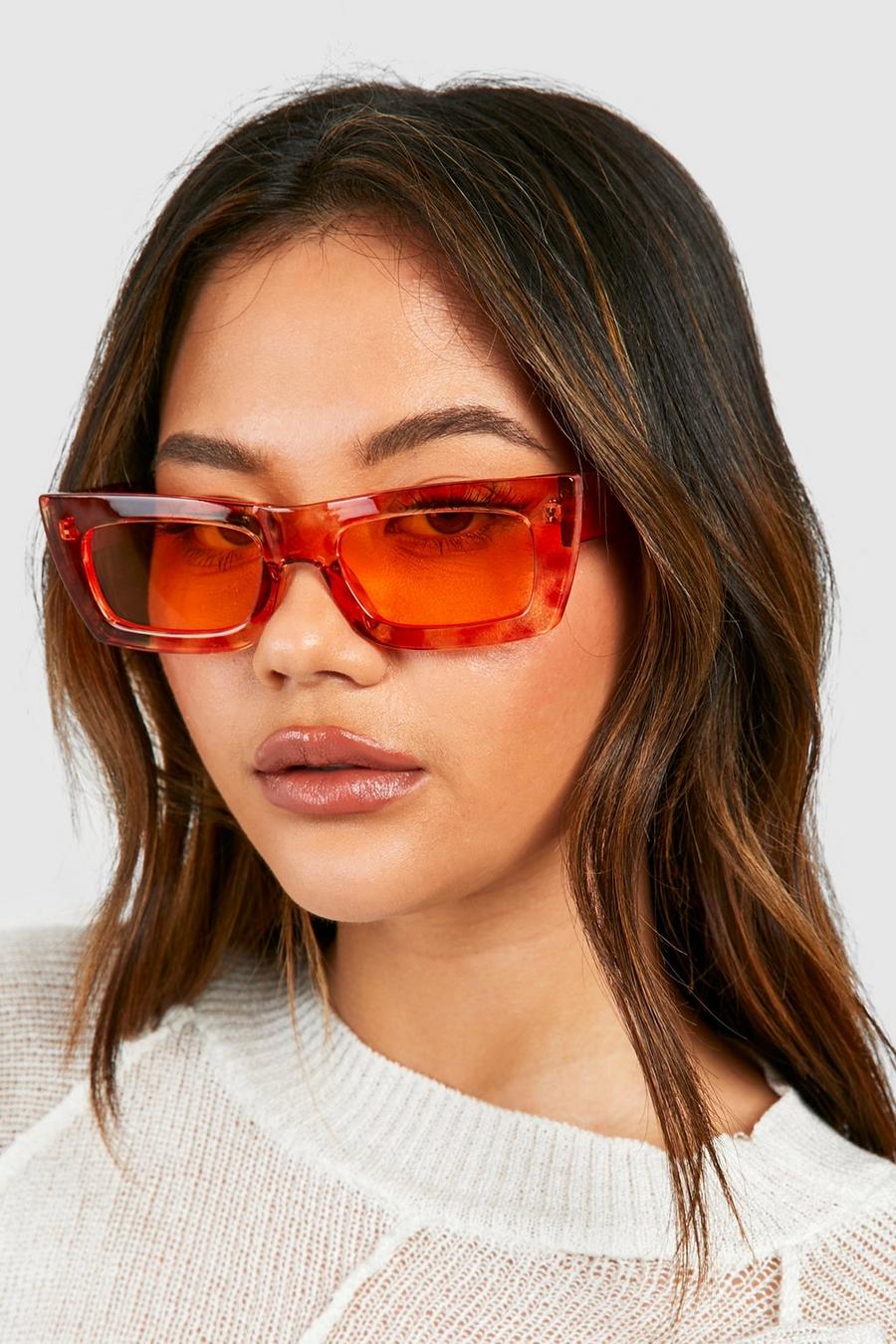 Fyrkantiga solglasögon med orange bågar