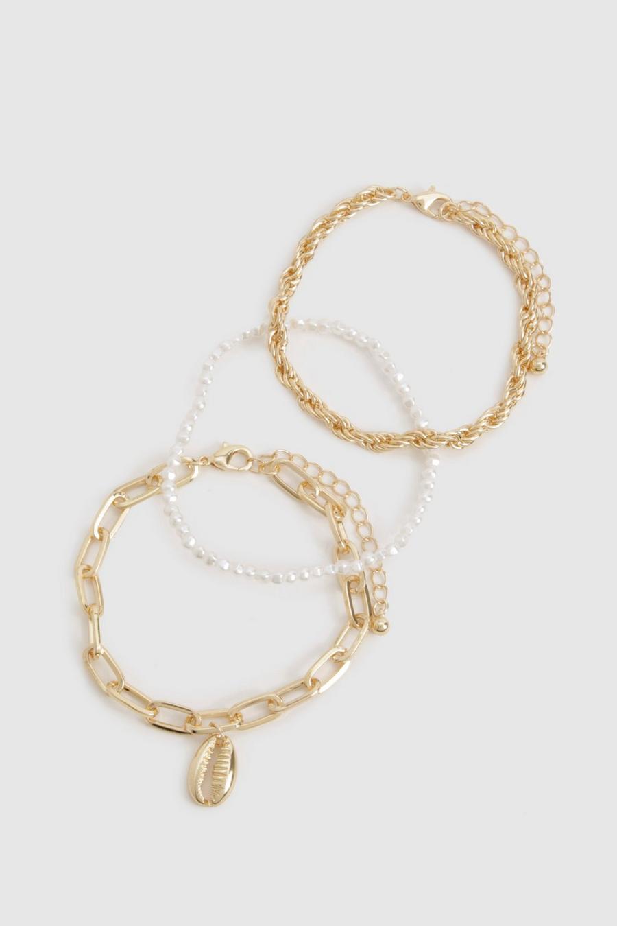 Multipaquete de pulseras con perlas y conchas, Gold image number 1