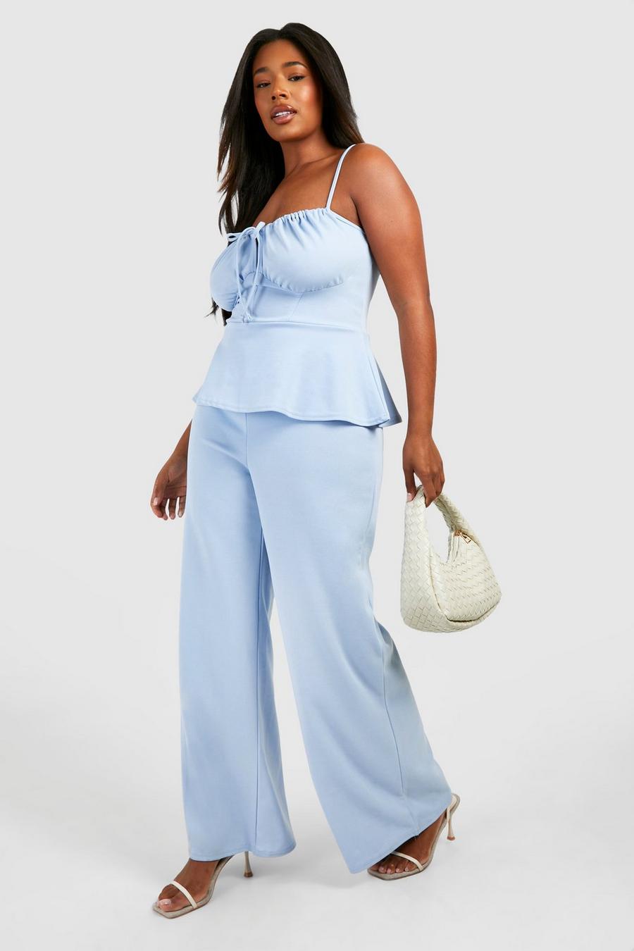 Dusty blue Plus Jumpsuit med peplum och vida ben