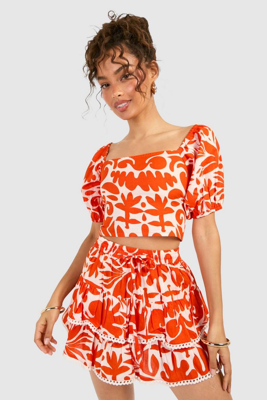 Rückenfreies Crop Top aus Baumwolle mit abstraktem Print und Häkelsaum, Orange
