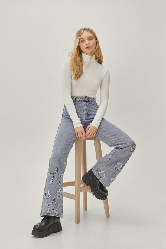 NastyGal Star Applique High Waisted Flared Jeans 1