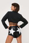 NastyGal Contrast Star Faux Leather Hot Pants Shorts thumbnail 1