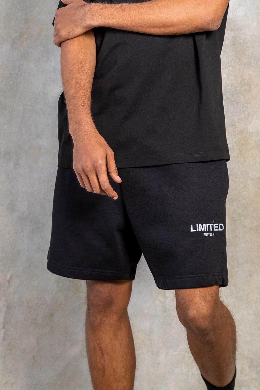 Black svart Loose Length Mid Limited Jersey Shorts image number 1