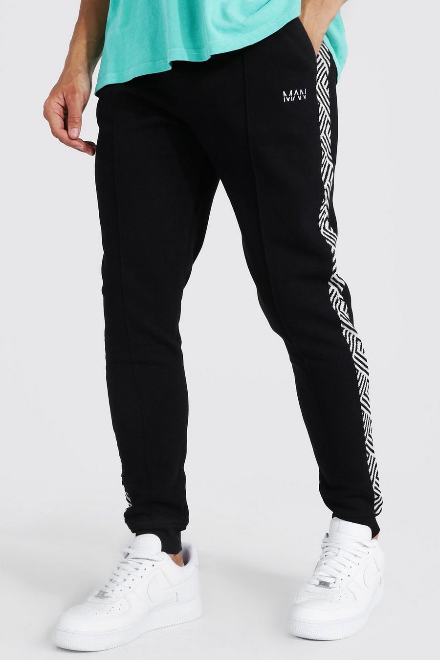 Pantalón deportivo pitillo de jacquard con panel lateral, Black negro image number 1