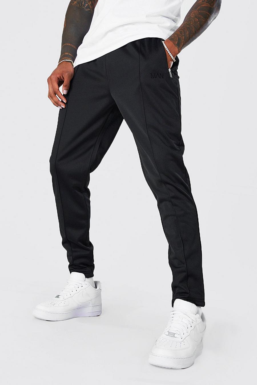 Pantalón deportivo pitillo de tejido por urdimbre con alforza, Black negro image number 1