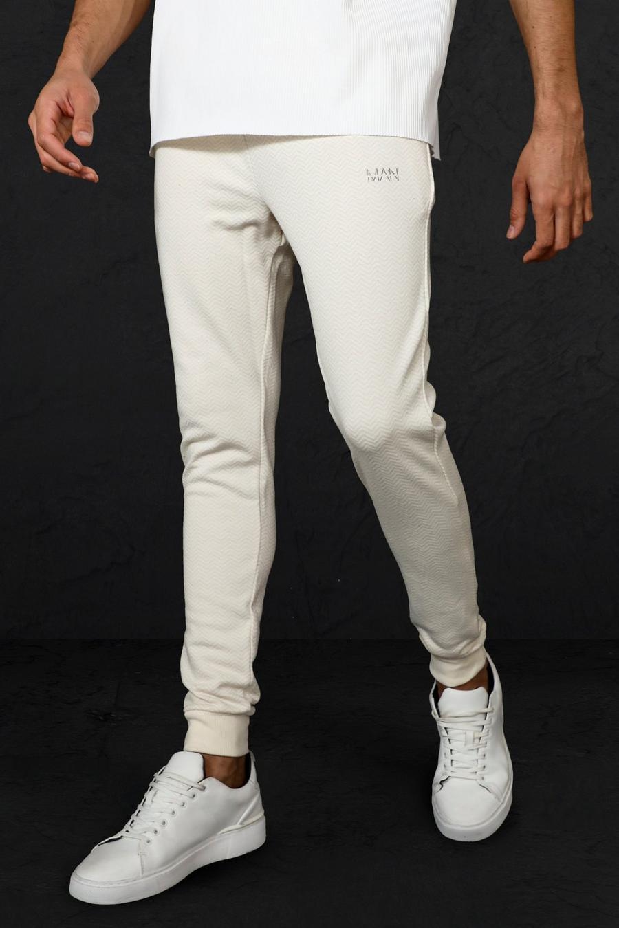 Stone beige Joggers i skinny fit med tryck image number 1