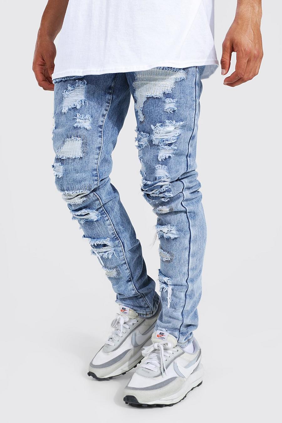 Ice blue Tapered Stacked All Over Rip Jeans image number 1