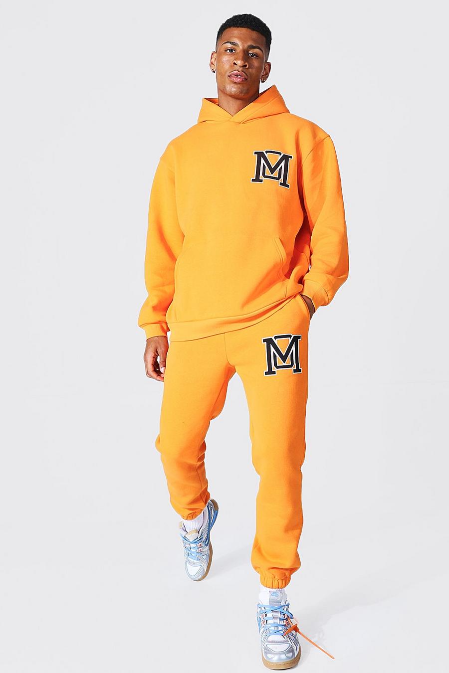 Orange Träningsoverall med oversize hoodie i varsitystil image number 1