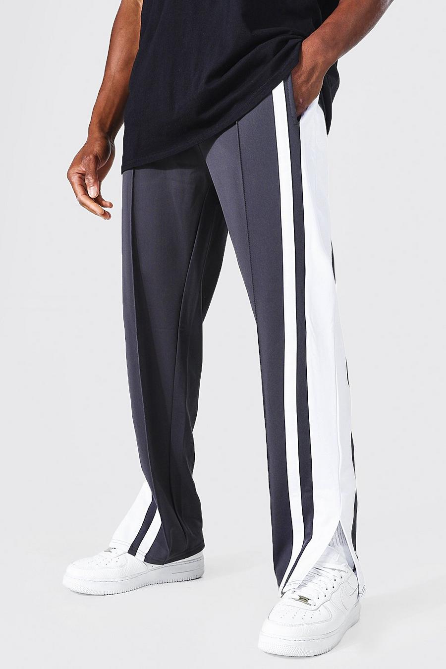 Pantalón deportivo MAN Original de tejido por urdimbre con pernera ancha y paneles, Charcoal gris image number 1