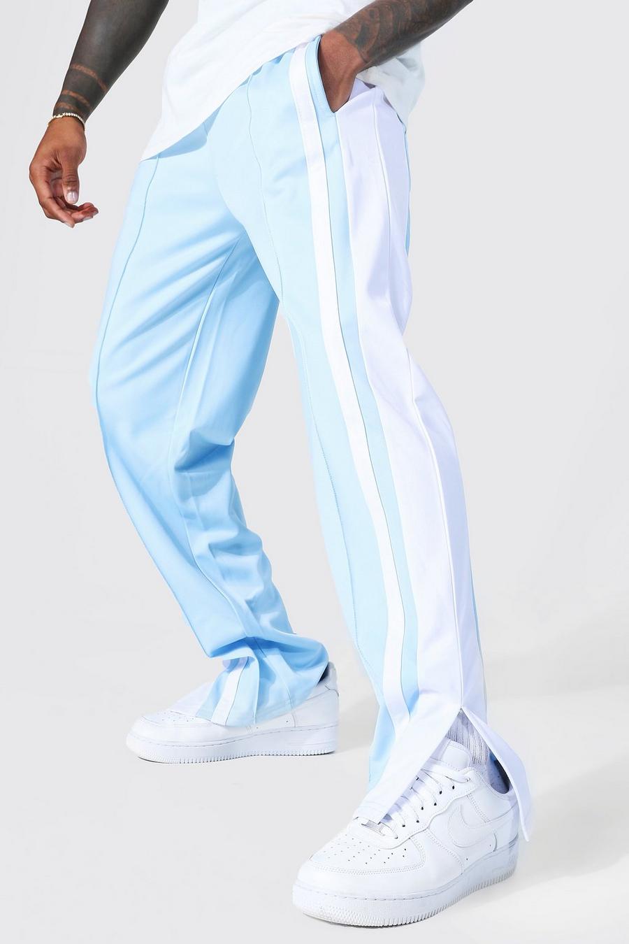 Pantalón deportivo MAN Original de tejido por urdimbre con pernera ancha y paneles, Light blue azul image number 1
