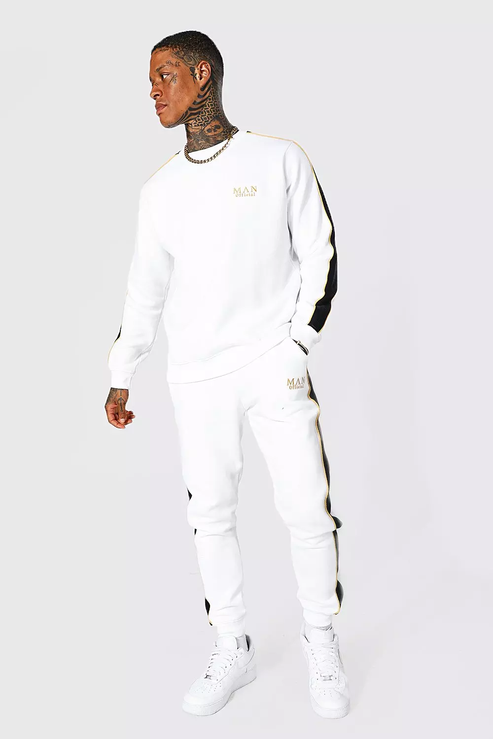 White and gold store tracksuit