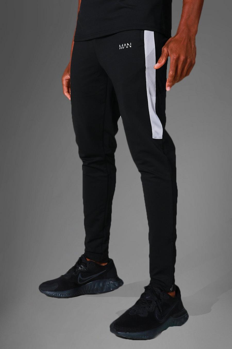 שחור מכנסי טרנינג ספורטיביים לאימונים עם פאנל ודוגמה מסדרת Man image number 1