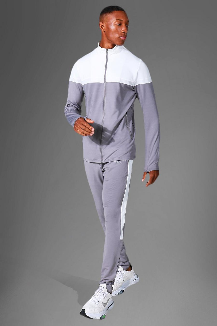 אפור חליפת טרנינג ספורטיבית לאימונים עם בלוק צבע ורוכסן מסדרת Man image number 1