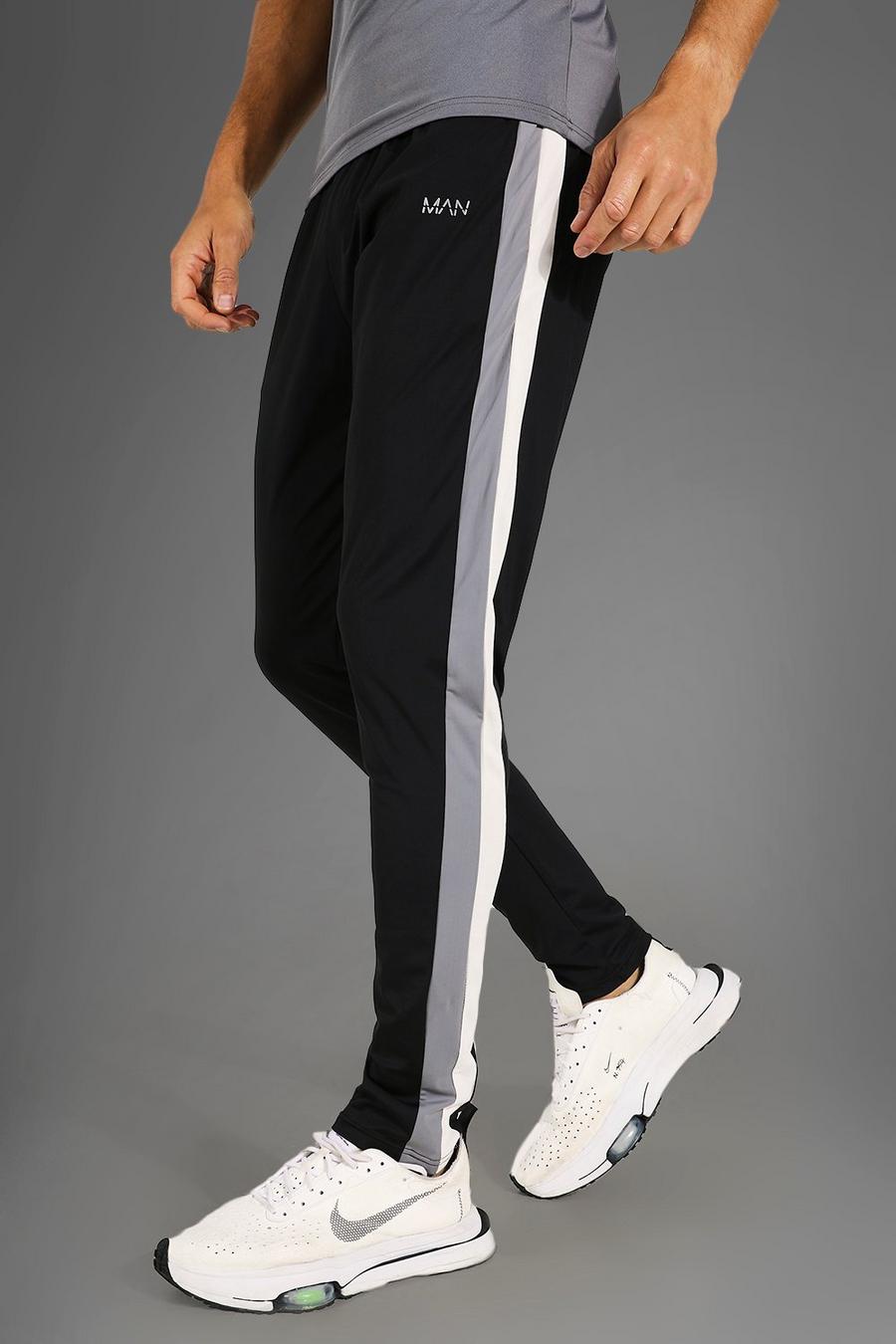 שחור מכנסי טרנינג ספורטיביים לאימונים עם בלוק צבע מסדרת Man, לגברים גבוהים image number 1