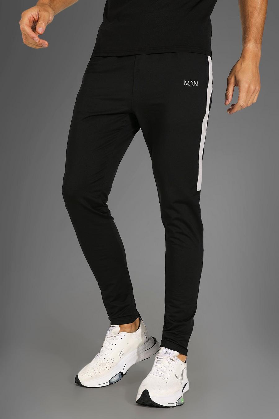 שחור מכנסי טרנינג ספורטיביים לאימונים עם דוגמה מסדרת Man, לגברים גבוהים image number 1