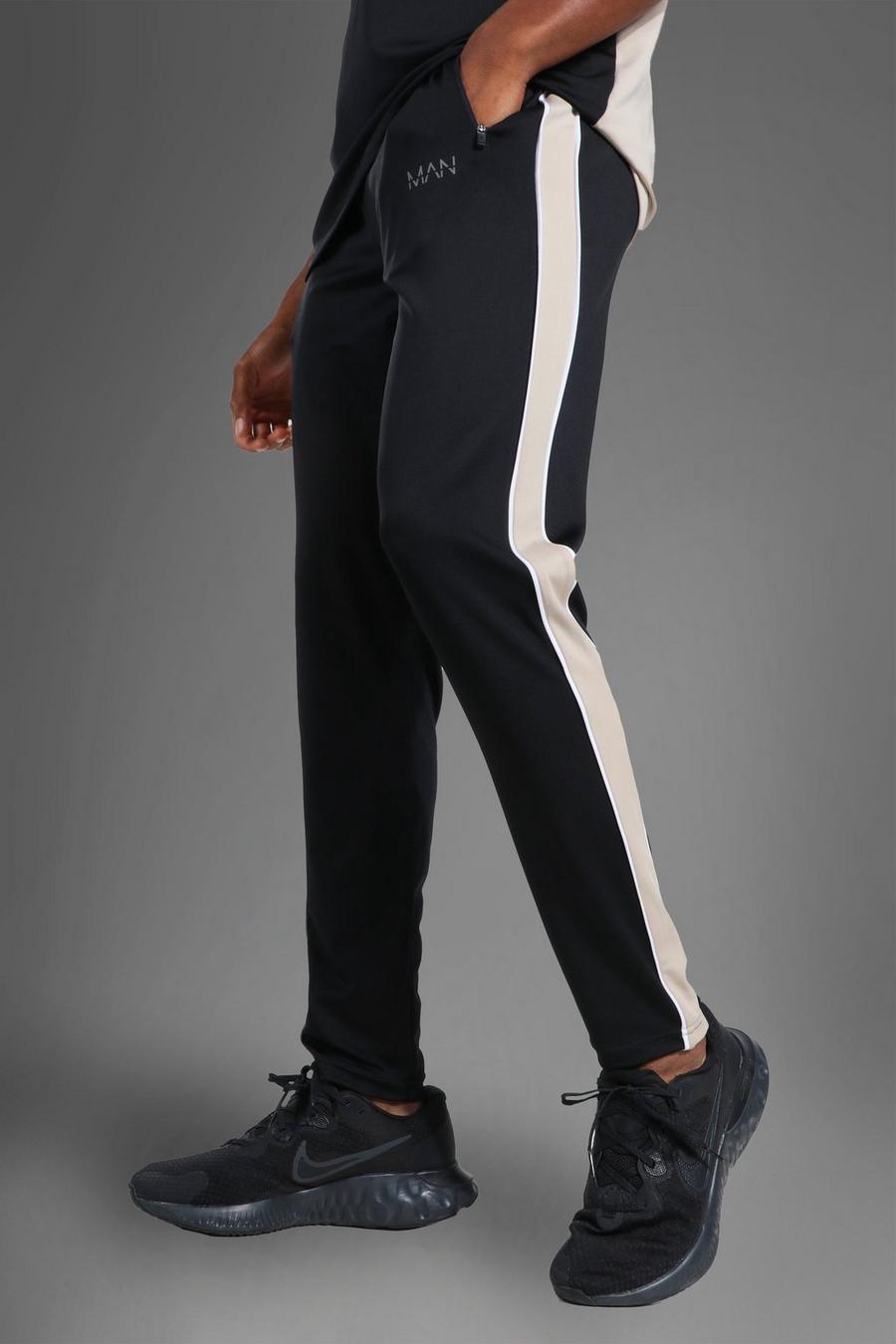 שחור מכנסי ריצה ספורטיביים עם פס בצד וכיתוב Man image number 1