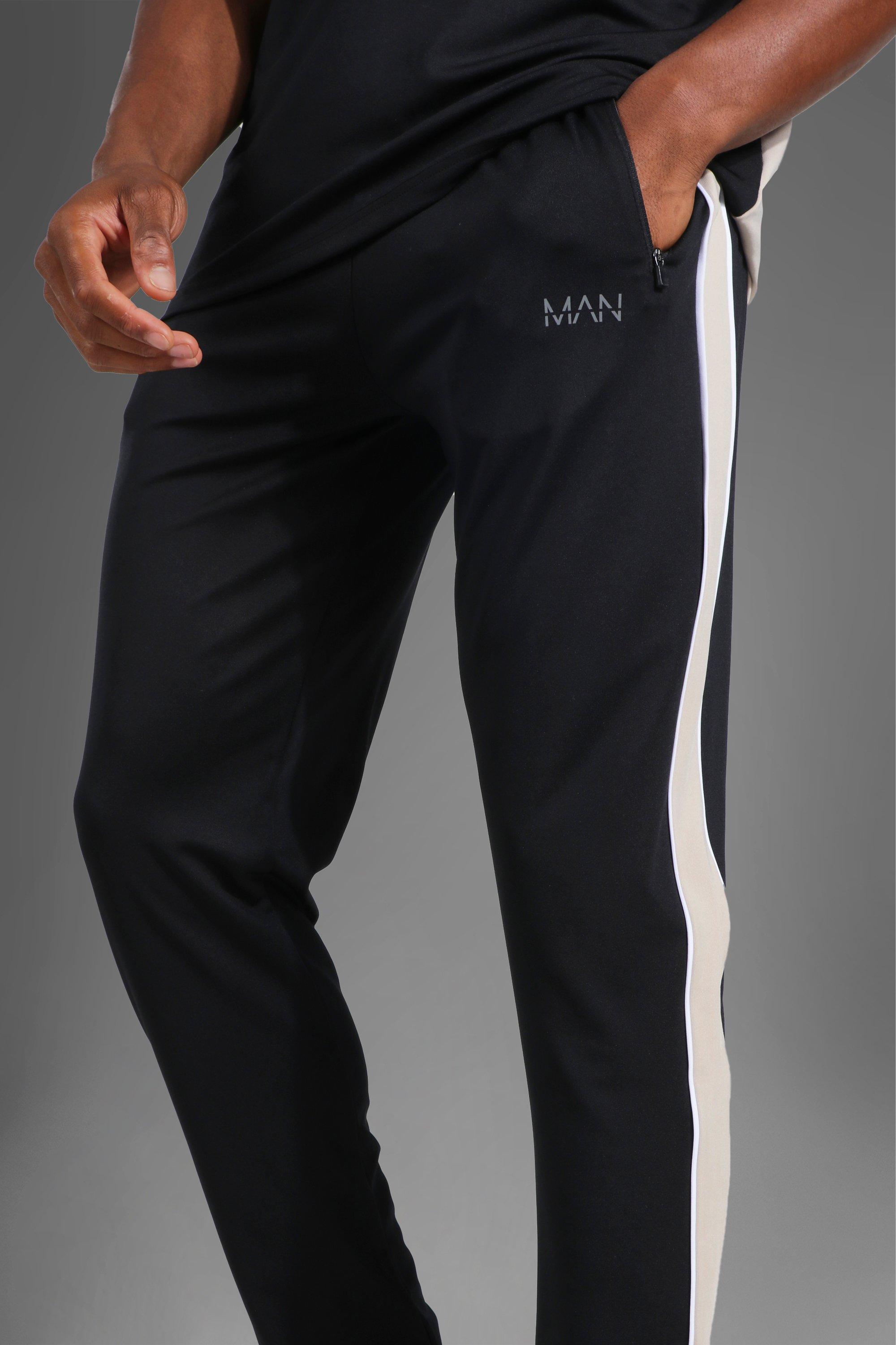 Pantalon con franja lateral hombre new arrivals