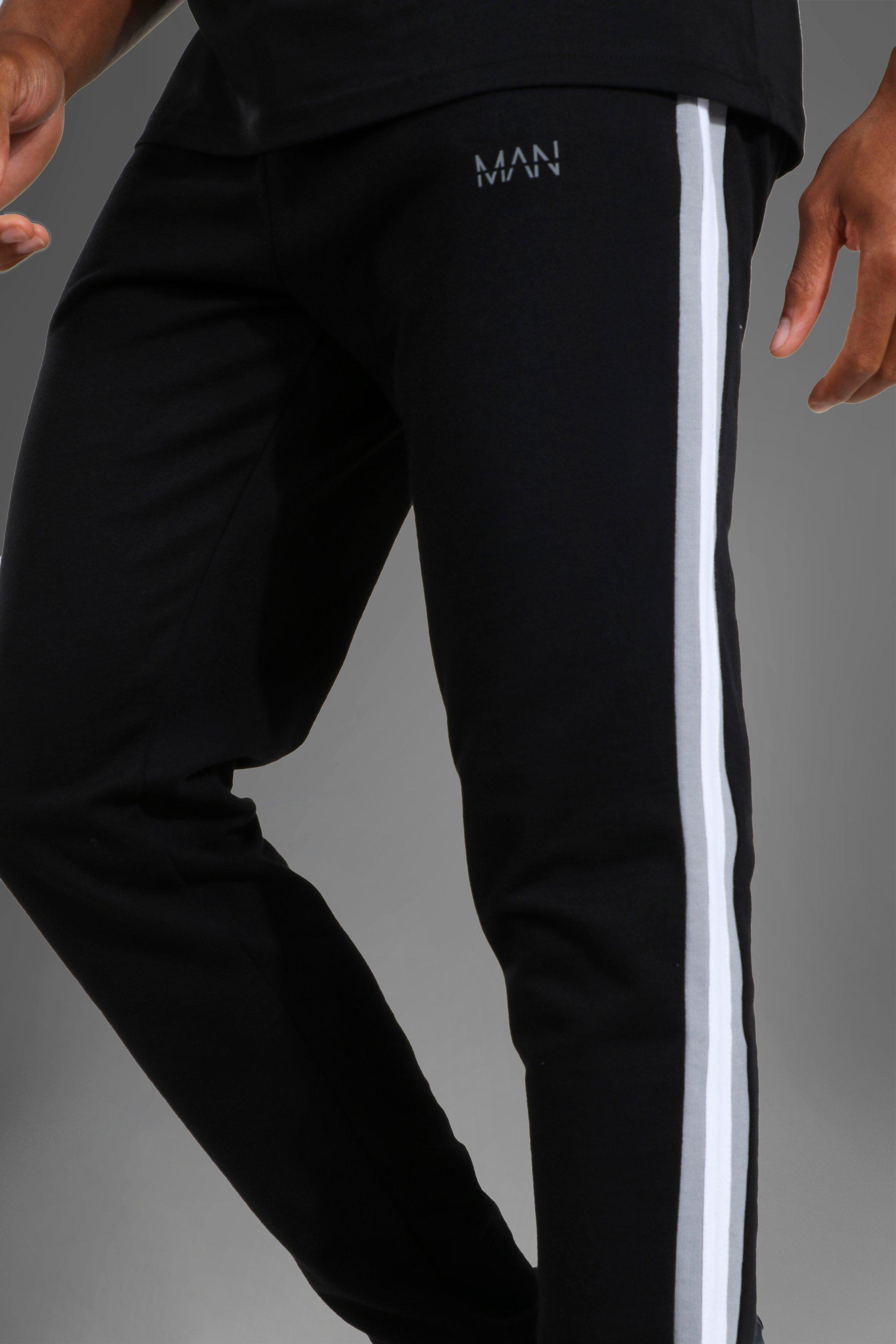 Pantalon con best sale franja lateral hombre