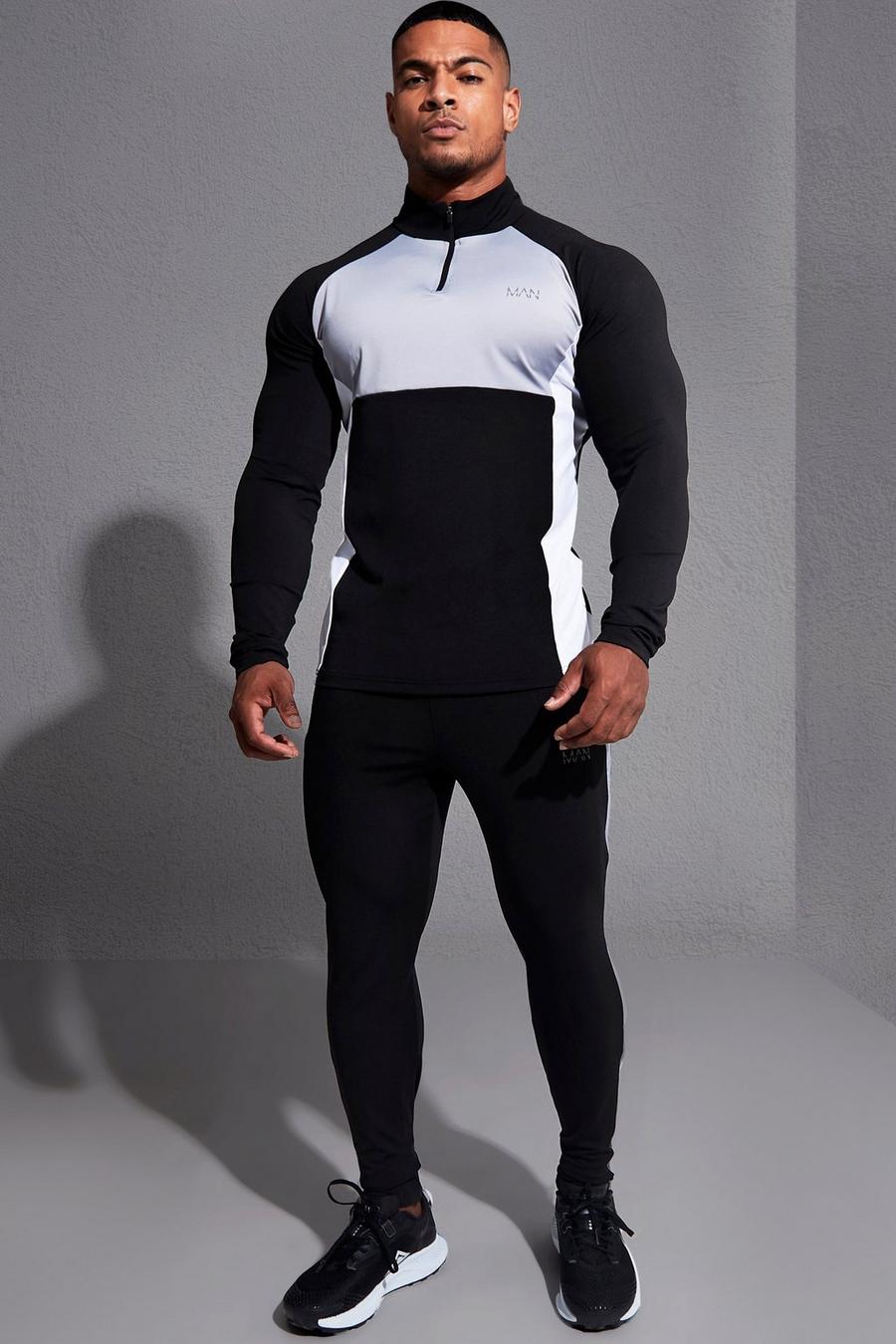 Black svart MAN Active Träningsoverall med hög krage och blockfärger image number 1